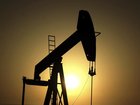 Oil prices slipped in early Asian trade on Monday after OPEC+ agreed to another large production hike in September.
