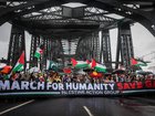 People march across the Harbour Bridge during the pro-Palestinian rally on August 03, 2025 in Sydney.