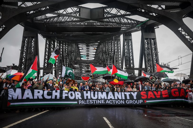 People march across the Harbour Bridge during a pro-Palestinian rally in Sydney.