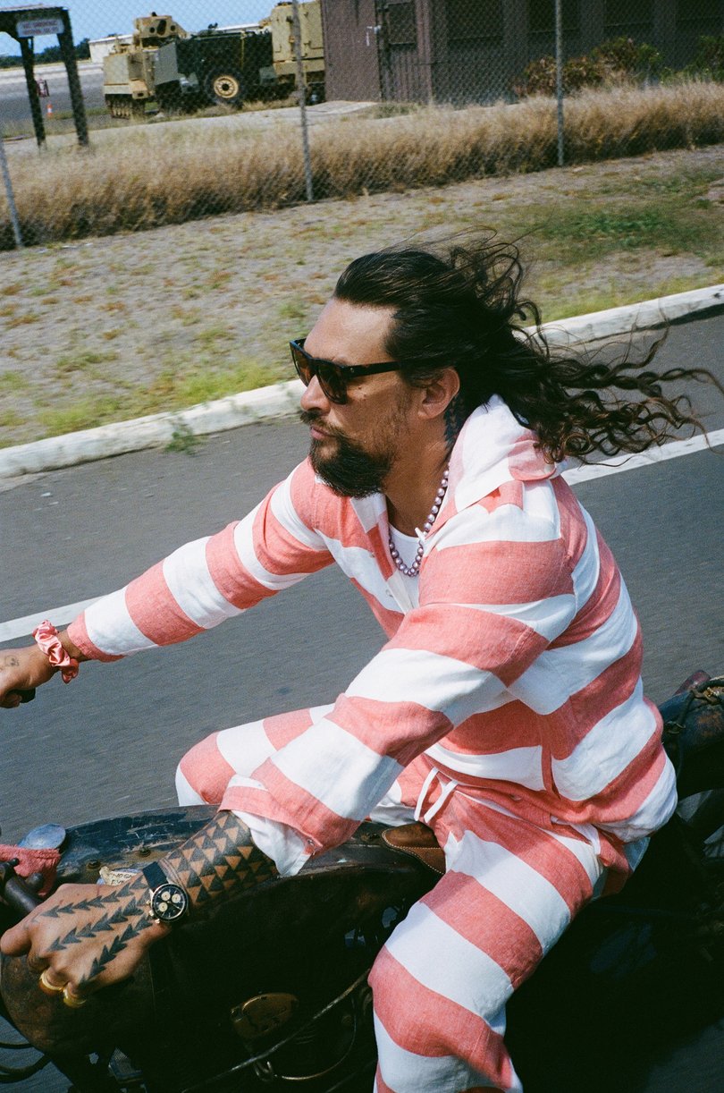 Jason Momoa rides his motorcycle in Oahu, Hawaii.
