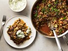 A serving of pork-cabbage casserole, topped with Greek yoghurt and garnished with fresh dill, in New York, February 1, 2023. This recipe, a mashup of several, crosses a caramelised cabbage and onion saute with a lasagne-like casserole. Food stylist: Simon Andrews (Armando Rafael/The New York Times)