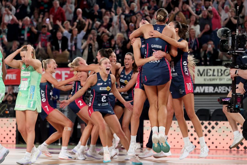 The Vixens celebrate winning the 2025 Super Netball grand final.