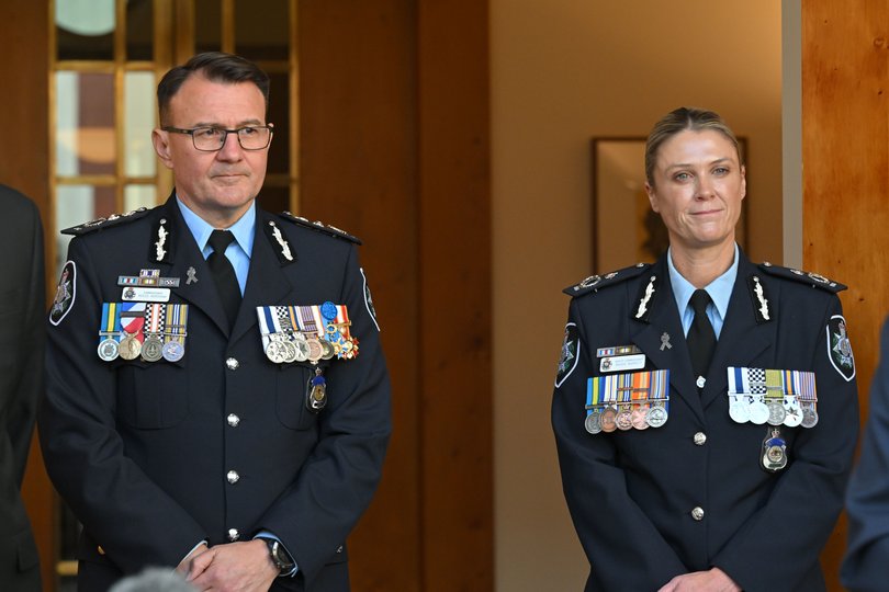 Incoming Australian Federal PoliceCommissioner Krissy Barrett and outgoing AFP Commissioner Reece Kershaw at a press conference at Parliament House in Canberra, Monday.
