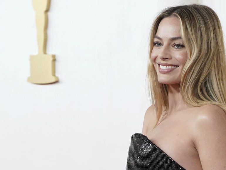 Margot Robbie is in talks to star in a remake of the 1958 horror film Attack Of The Fifty Foot Woman (AP PHOTO)