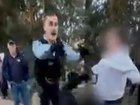 A 32-year old woman was allegedly pushed to the ground by a police officer after.