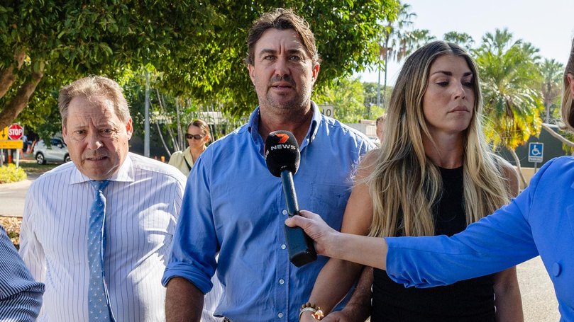 Matt Wright with his defence Senior Counsel David Edwardson KC, left, and supported by his wife Kaia Wright outside the Supreme Court in Darwin.