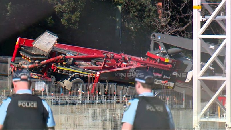 A man has died and another has been critically injured in a workplace accident in Carlingford, Sydney.