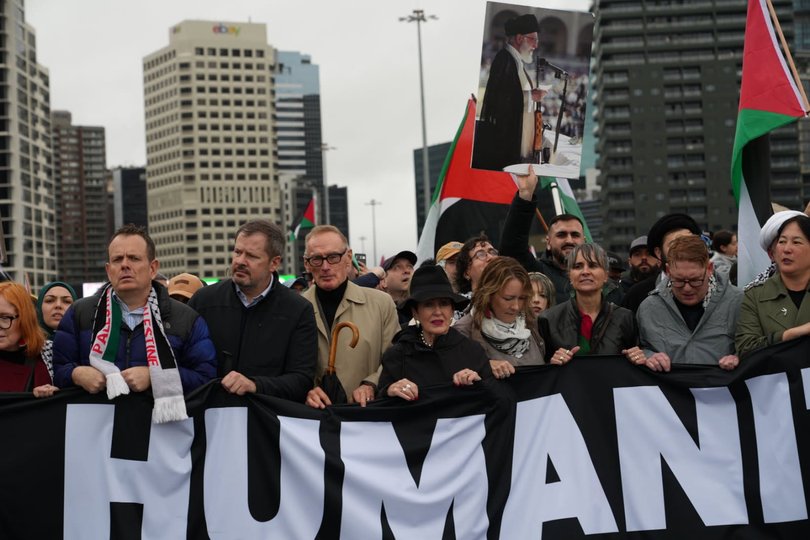 Sydney mayor Clover Moore, in a black hat, next to former foreign minister Bob Carr at Sunday’s march over the Sydney Harbour Bridge.