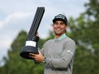 Joaquin Niemann of Torque GC poses with the individual trophy on day three of LIV Golf UK on July 27.