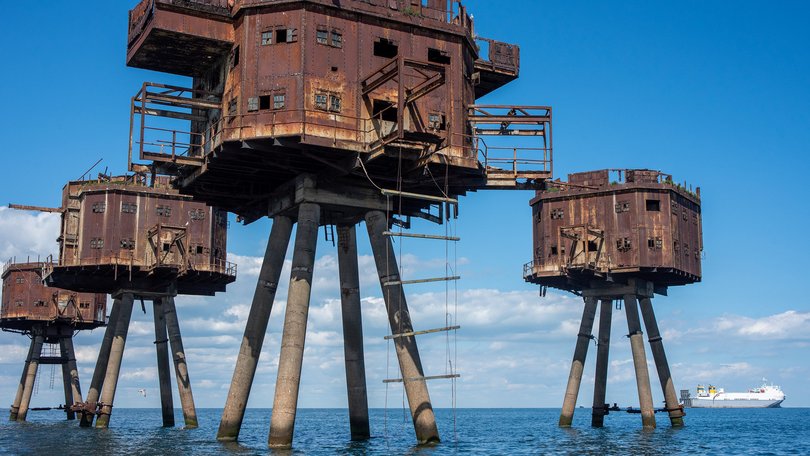 The rusting remains of the Maunsell Forts are seen close to the shore at Whitstable off the east coast of England.