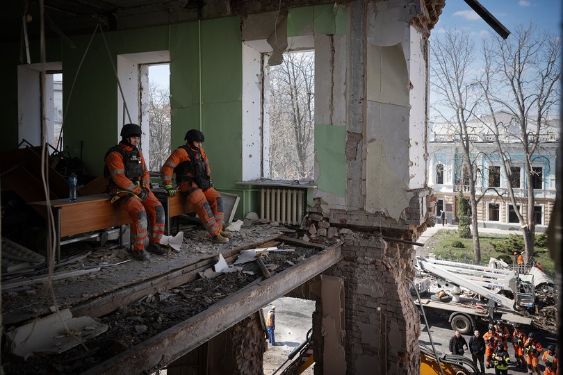 Rescue workers after a Russian strike in Sumy, Ukraine.