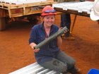 Margy Hawke inspects copper-rich massive sulphide in drill core trays from DeGrussa Unknown