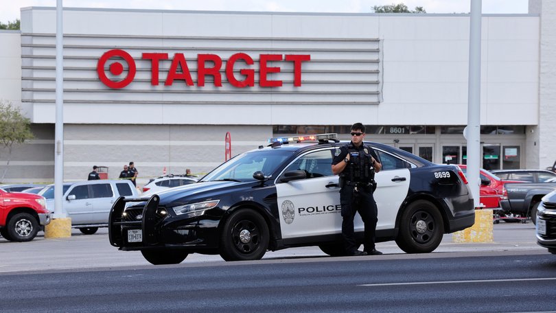 Police block the entrance to a Target after a shooting in Austin, Texas.