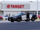 Police block the entrance to a Target after a shooting in Austin, Texas.