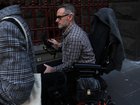 Mark Ludbrook, who uses a wheelchair, walked for 90 minutes before killing a friend, a jury heard.