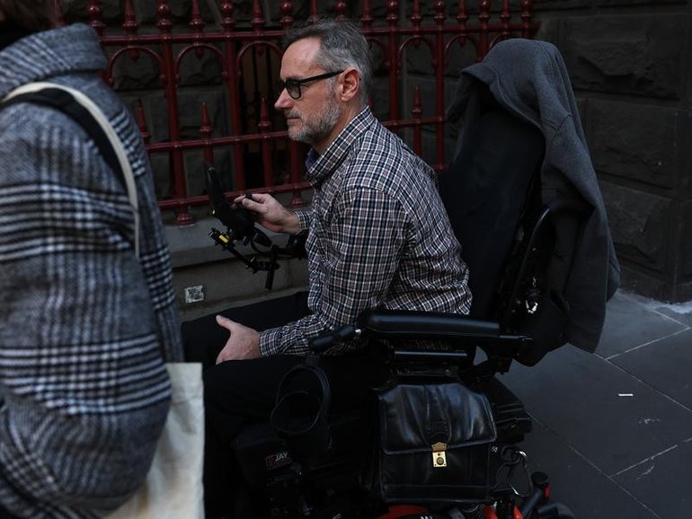 Mark Ludbrook, who uses a wheelchair, walked for 90 minutes before killing a friend, a jury heard.