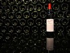A bottle of Penfolds Grange 2009 vintage, produced by Treasury Wine Estates Ltd., is arranged for a photograph at the company's headquarters in Melbourne, Australia, on Monday, Aug. 18, 2014. Treasury Wine said on Aug. 11 a second buyout firm had matched a A$3.4 billion ($3.2 billion) bid from New York-based KKR & Co. and Rhone Capital LLC for the winemaker. A person familiar with the matter named TPG Capital as the suitor. Photographer: Carla Gottgens/Bloomberg