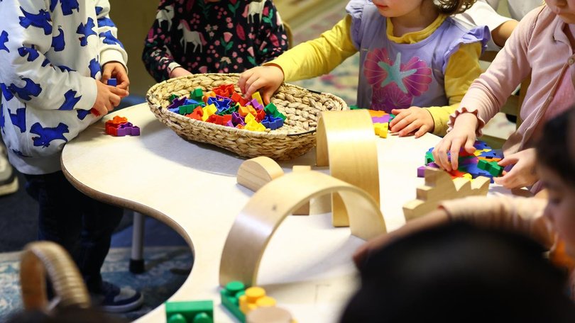 A childcare worker sacked for grooming toddlers still has a valid working with children work permit.