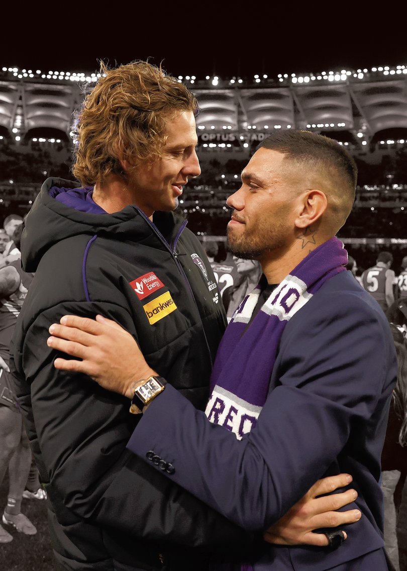Michael Walters of the Dockers shares a moment with Nat Fyfe after retiring.