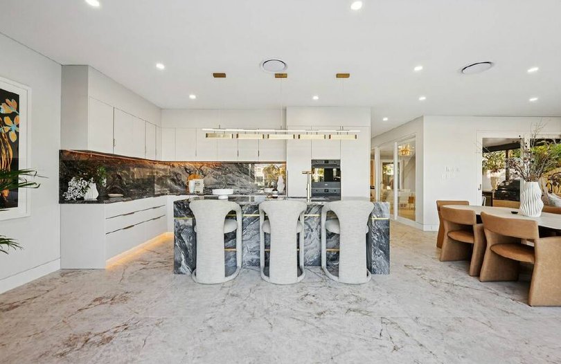 A modern retro vibe is present in this waterside property.