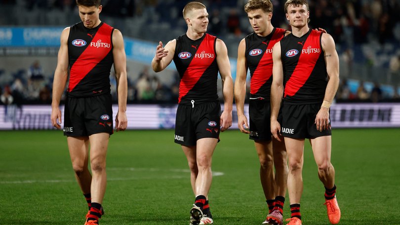 Dejected Bombers after another loss.