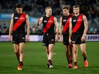 Dejected Bombers after another loss.