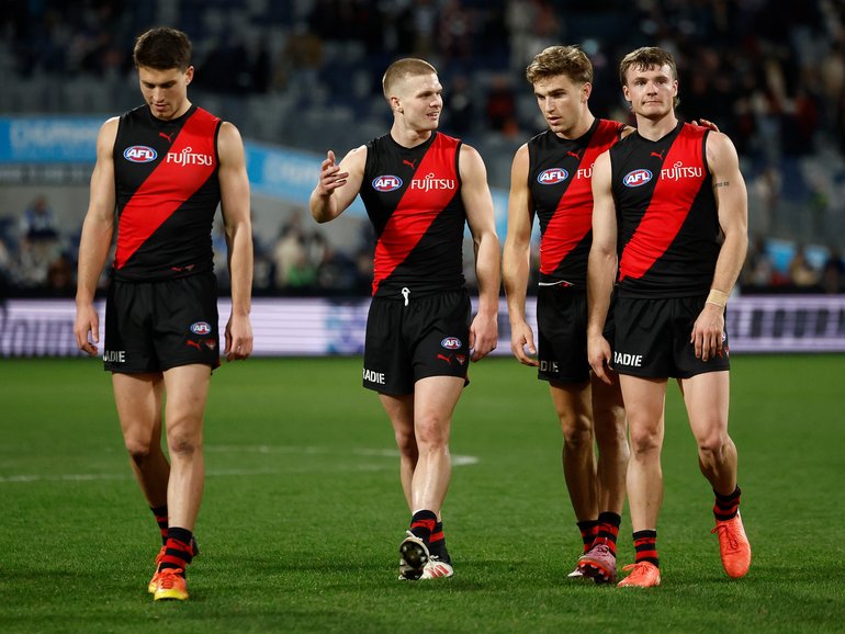 Dejected Bombers after another loss.