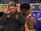 Harley Reid of the Eagles shares a moment with Liam Ryan.
