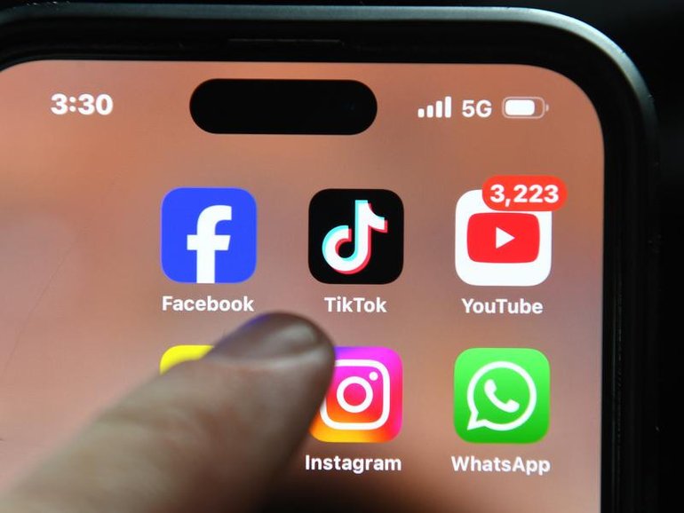 A young woman has been charged after allegedly threatening to kill someone online. 