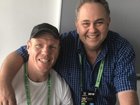 Andrew Moore (right) has been hospitalised following a heart attack.