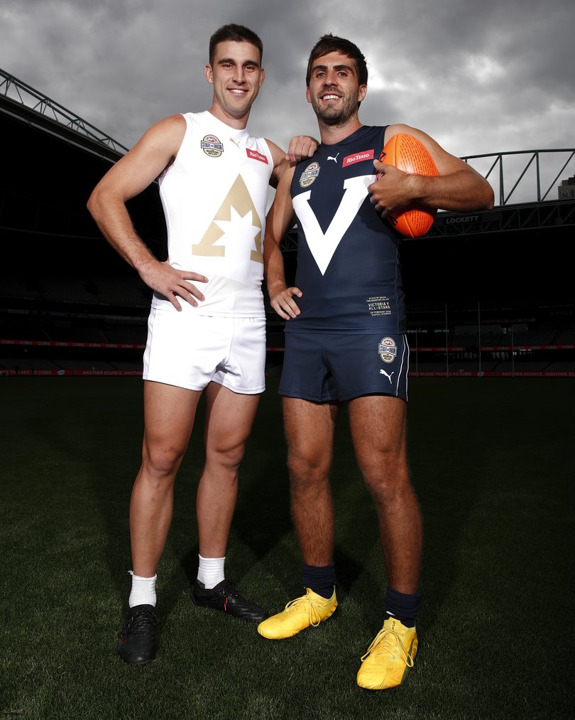 Elliot Yeo of the All Stars and Andrew Gaff of Victoria pose for a photo during the State of Origin for Bushfire Relief training session.