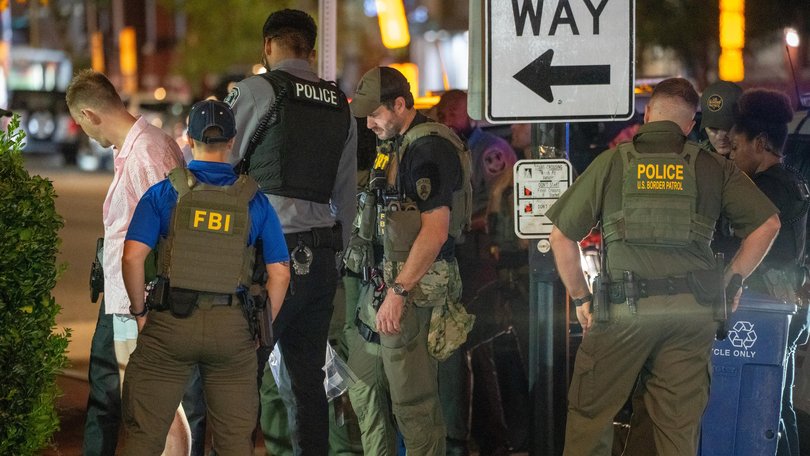  FBI and Border Patrol officers arrest Sean Charles Dunn, after he assaulted law enforcement with a sandwich.