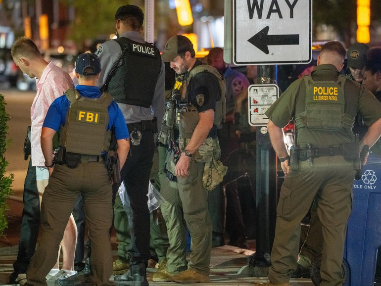  FBI and Border Patrol officers arrest Sean Charles Dunn, after he assaulted law enforcement with a sandwich.