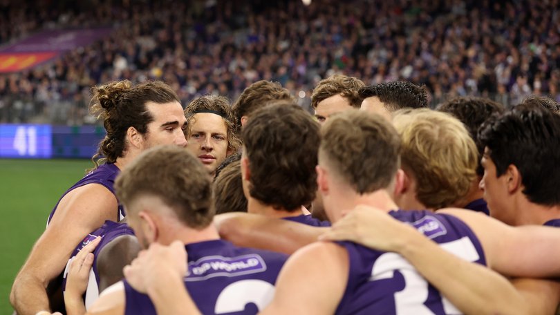 PERTH, AUSTRALIA - AUGUST 15:  Nat Fyfe of the Dockers in the team huddle during the round 23 AFL match between Fremantle Dockers and Brisbane Lions at Optus Stadium on August 15, 2025 in Perth, Australia. (Photo by Janelle St Pierre/AFL Photos/Getty Images)