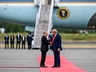 US President Donald Trump and Russian President Vladimir Putin meet at an airport ahead of their meeting at Joint Base Elmendorf-Richardson. 