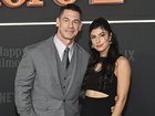 John Cena, with wife Shay Shariatzadeh, says he wishes he had a hair transplant a decade ago.