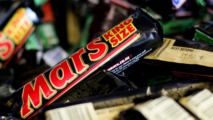 A man has died after shopkeepers allegedly violently beat him because he stole a bar of chocolate. 