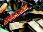 A man has died after shopkeepers allegedly violently beat him because he stole a bar of chocolate. 