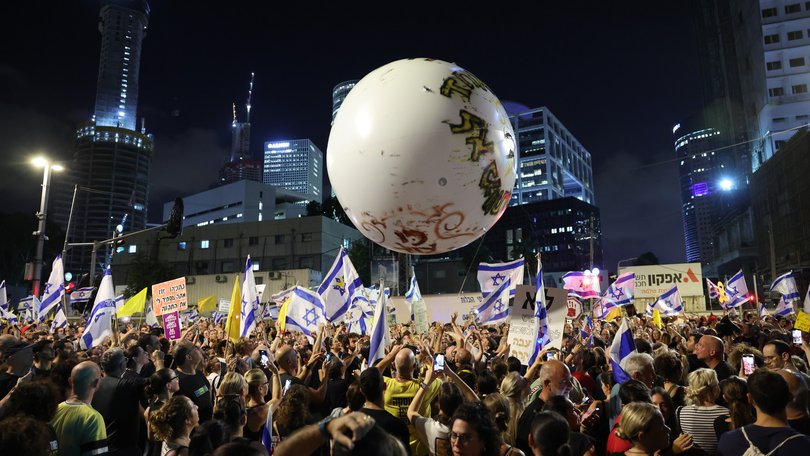 Protesters supporting the families of Israeli hostages held by Hamas in Gaza take part in a nationwide strike protest in Tel Aviv.