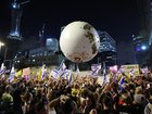 Protesters supporting the families of Israeli hostages held by Hamas in Gaza take part in  a nationwide strike protest in Tel Aviv.