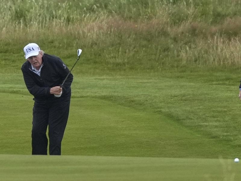 President Donald Trump is combining golf with political meetings on his trip to Scotland.