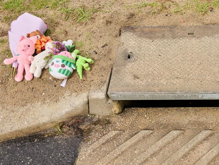 There's no evidence to suggest the baby boy was washed through the drain, police say.