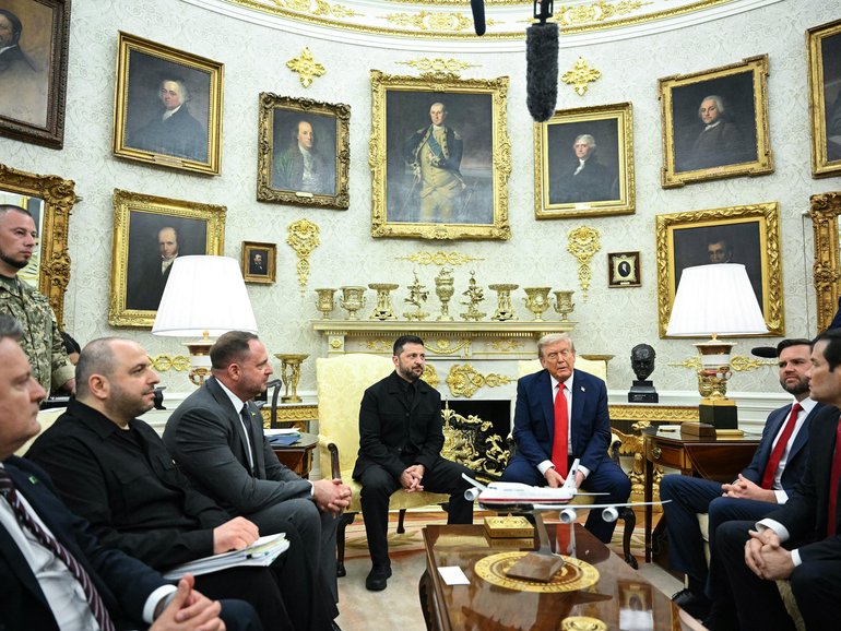 Ukrainian President Volodymyr Zelensky and US President Donald Trump participate in a meeting in the Oval Office of the White House in Washington.
