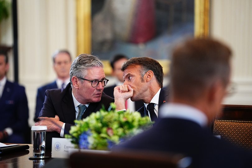 UK Prime Minister Keir Starmer and French President Emmanuel Macron speak as they participate in a Multilateral Meeting with European Leaders in the East Room.