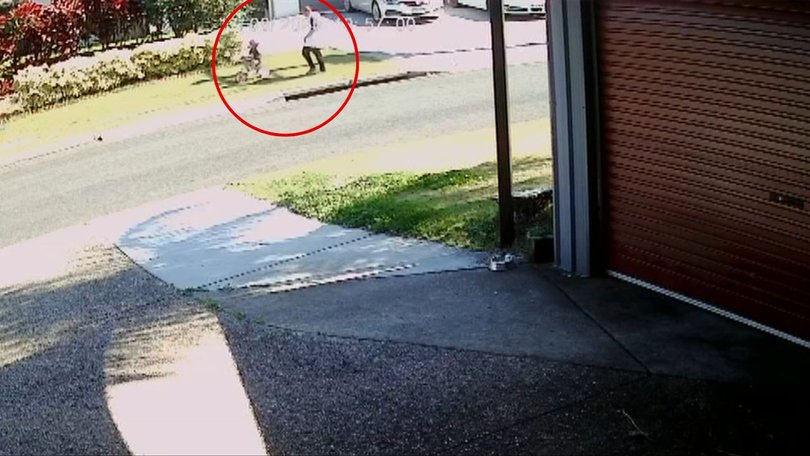 A chilling video shows a father and his son moments before they were killed on the footpath by an alleged drunk driver in Logan.