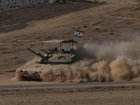 Israeli tanks have advanced on a neighbourhood on Gaza City's outskirts amid truce hopes. (AP PHOTO)