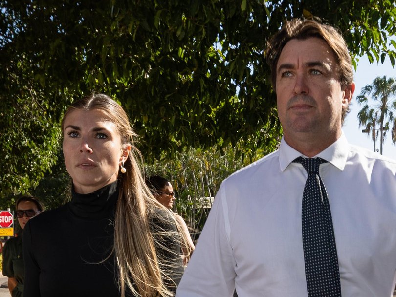 Outback Wrangler Matt Wright and his wife Kaia Wright alongside his Defence Senior Counsel David Edwardson.