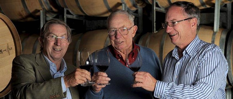 Robert Oatley (centre) toasts the success of his wines with his son Sandy (right) and Robert Oatley Vineyards managing director, Chris Hancock.
