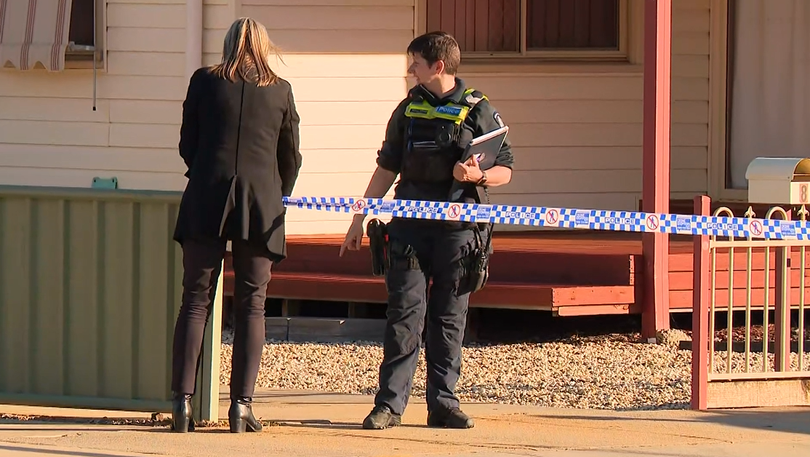 Two children were present at the home where the woman’s body was found.