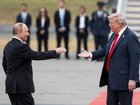 President Donald Trump greets President Vladimir Putin of Russia as they met in Alaska.